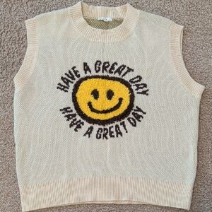 Sleeveless V-Neck Knit Vest with Yellow Smiley Graphic - Cream